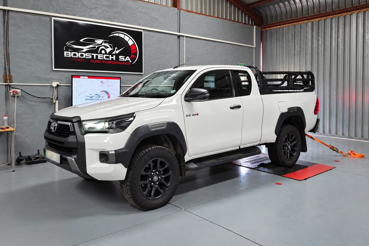 White Toyota Hilux on the dyno